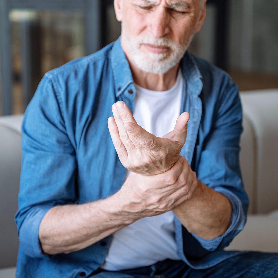 man holding his wrist