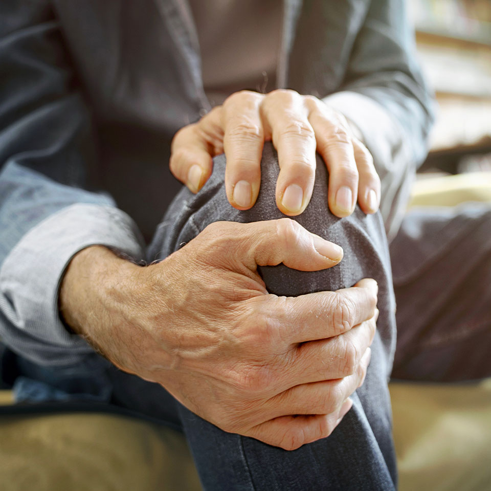 Old man suffering from knee